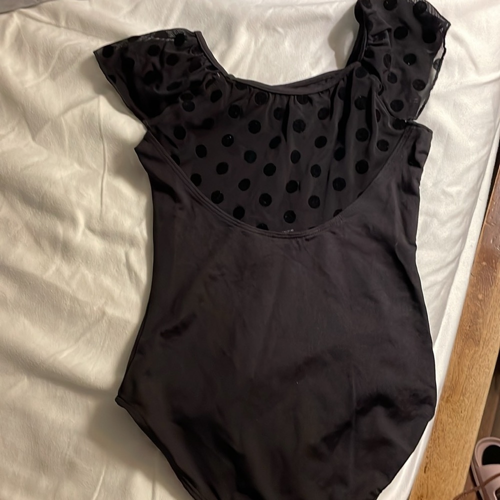 Black little girls leotard with cute velvety spots on the shoulders and back